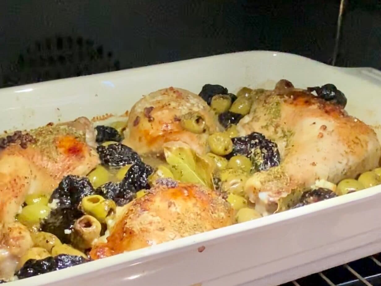A dish of chicken and other gut and mind-boosting ingredients in a roasting dish.